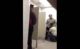 Caught some guys having fun in a public toilet