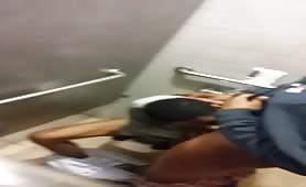 Public blowjob in a bathroom stall