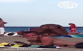 Caught Two horny black guys fucking on a nude beach in front of everybody