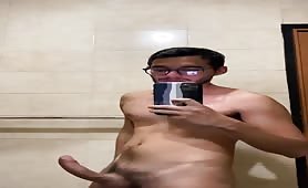 Masturbating completely naked in a public bathroom